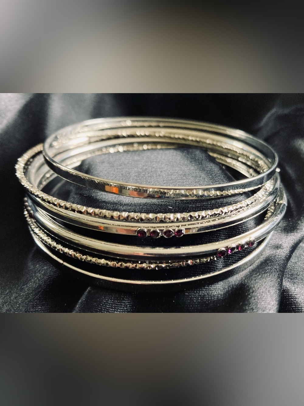 Silver Tone Bangle Set with Purple Stone Accents: Stackable